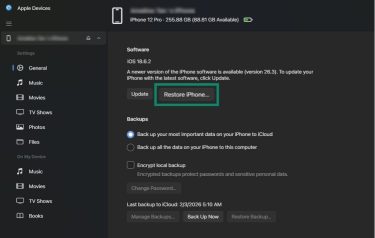 Apple device with "Restore iPhone. . ." highlighted.